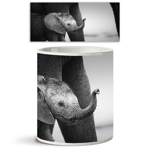 Baby Elephant Next To Cow Ceramic Coffee Tea Mug Inside White-Coffee Mugs-MUG-IC 5001392 IC 5001392, African, Animals, Art and Paintings, Baby, Black, Black and White, Children, Kids, Nature, Scenic, White, Wildlife, elephant, next, to, cow, ceramic, coffee, tea, mug, inside, elephants, africa, animal, art, artistic, b, w, beneath, big, calf, cute, display, gorgeous, huge, image, large, lift, loxodonta, mammal, monochrome, moody, national, nobody, outdoor, park, photograph, raised, reach, small, smell, toge